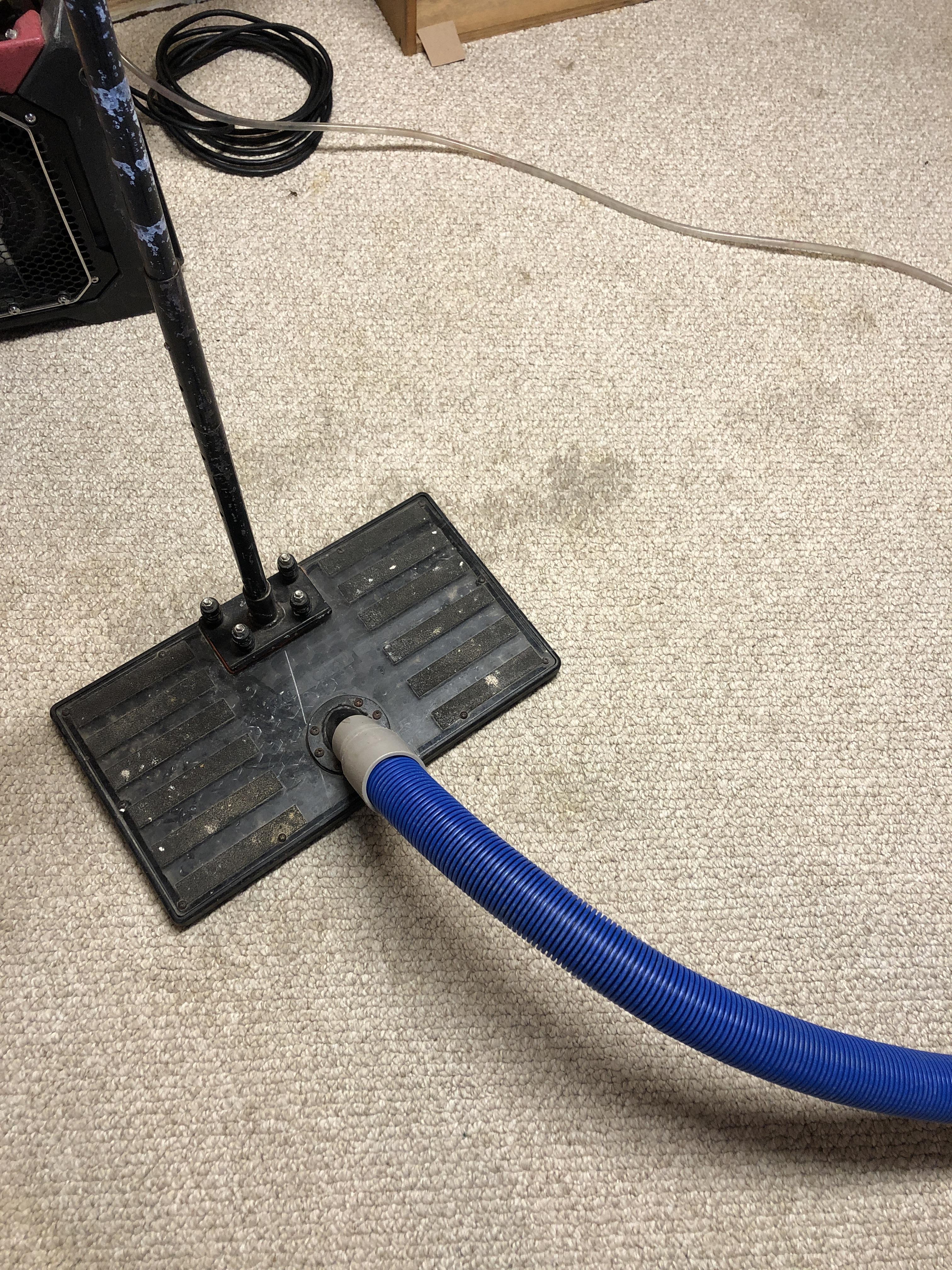 Extracting water from the carpet